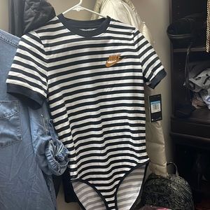 Brand new Nike body suit size M